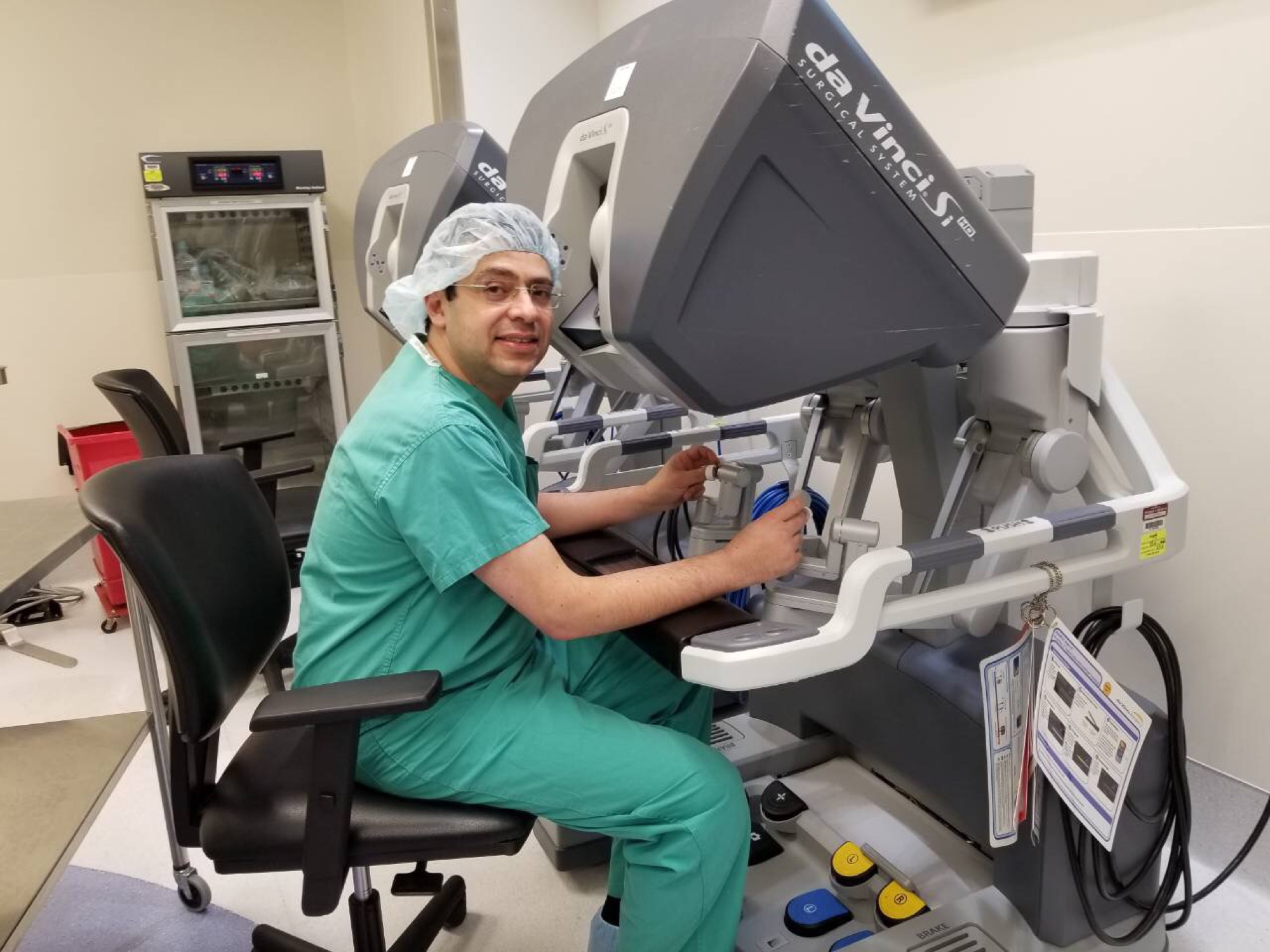 Dr. Kader performing robotic-assisted surgery