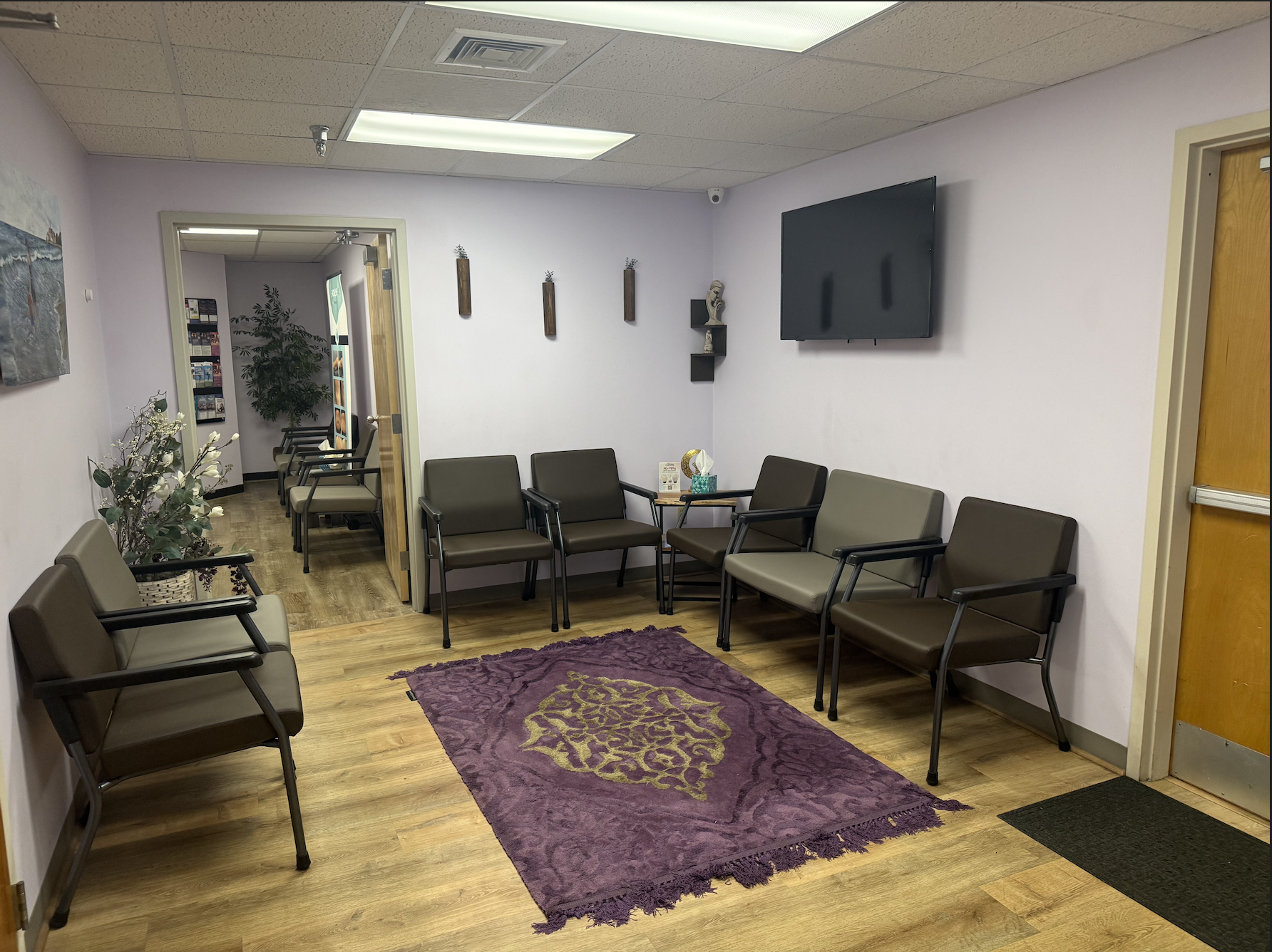 Venus OB-GYN waiting room — comfortable seating and warm decor